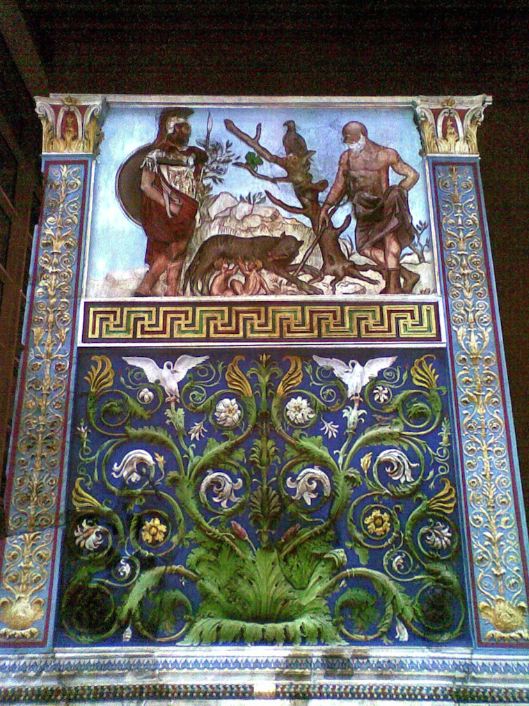 The Ara Pacis monument illuminated by coloured projection.