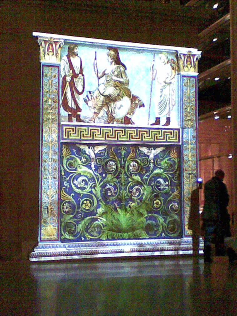 The Ara Pacis monument illuminated by coloured projection.