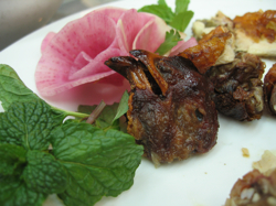 Chicken head with carved radish