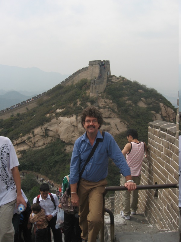 Picture of me in a blue shirt at the Great Wall in China