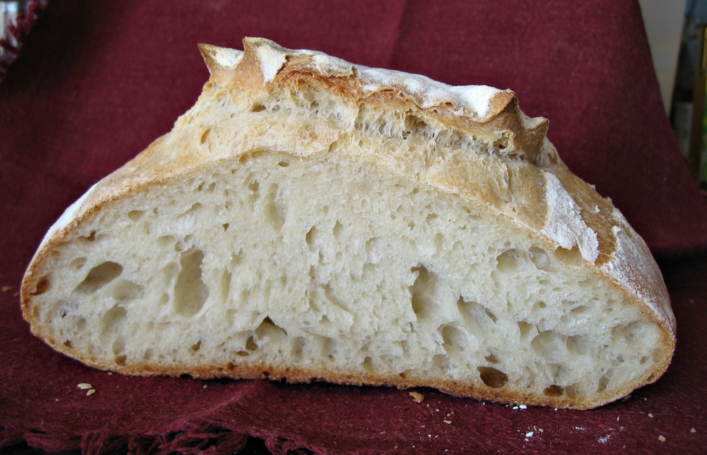 Loaf sliced open to show open, even crumb