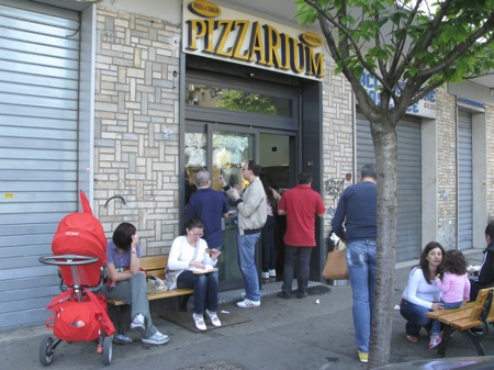 People queuing outside Pizzarium
