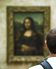 Man looking at the Mona Lisa