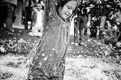 Participant in a very large public pillow fight in San Francisco